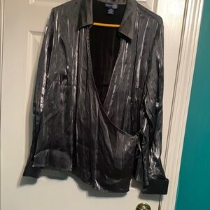 Women’s silver and black tied blouse at waist